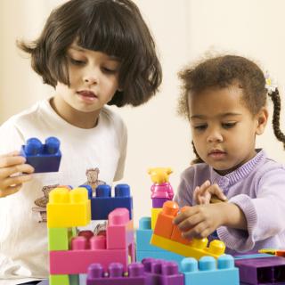 children playing with building blocks