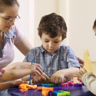 kids playing with play doh