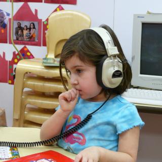 child with headphones