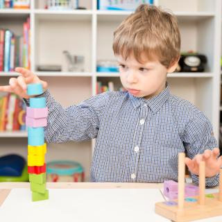child playing with blocks