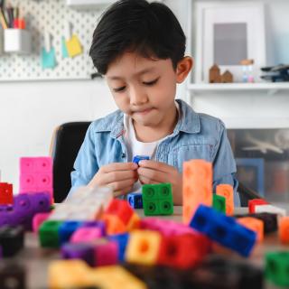 child playing with blocks