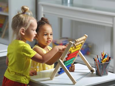 two children with abacus