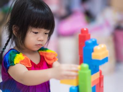 child playing with blocks