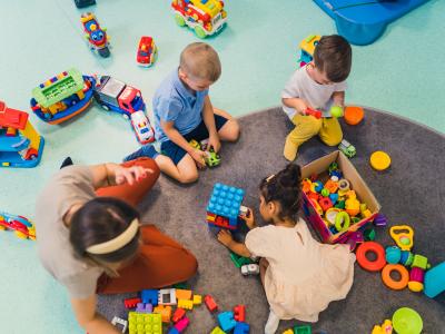 teacher and students playing